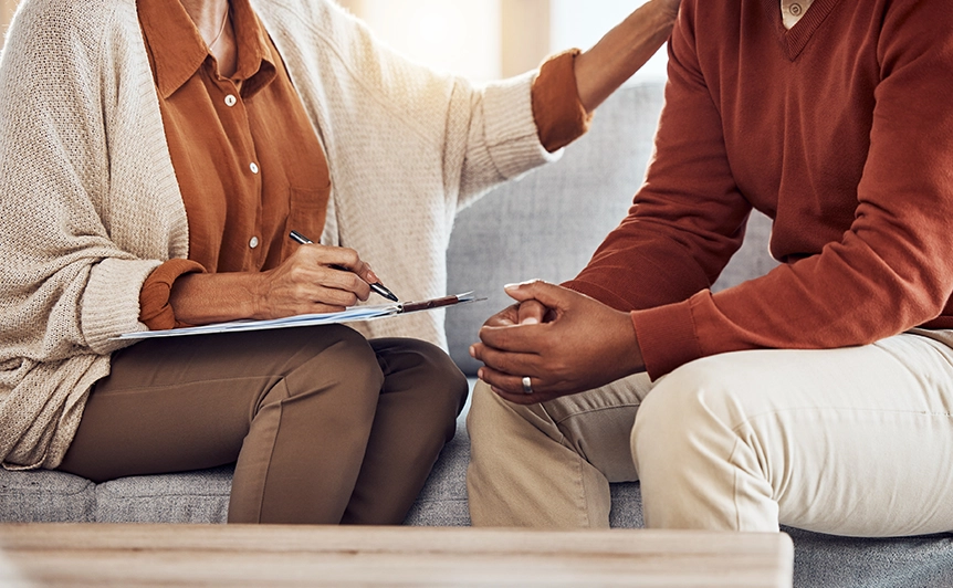Counselor and Client Discussing Relationship Issues on a Couch