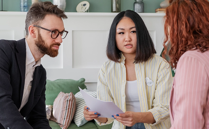 Counselor Discussing with Clients During Marriage and Family Counseling Session