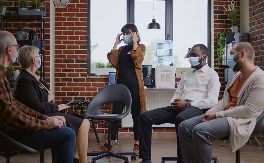Group Counseling Session in Upland Office with Participants Wearing Masks